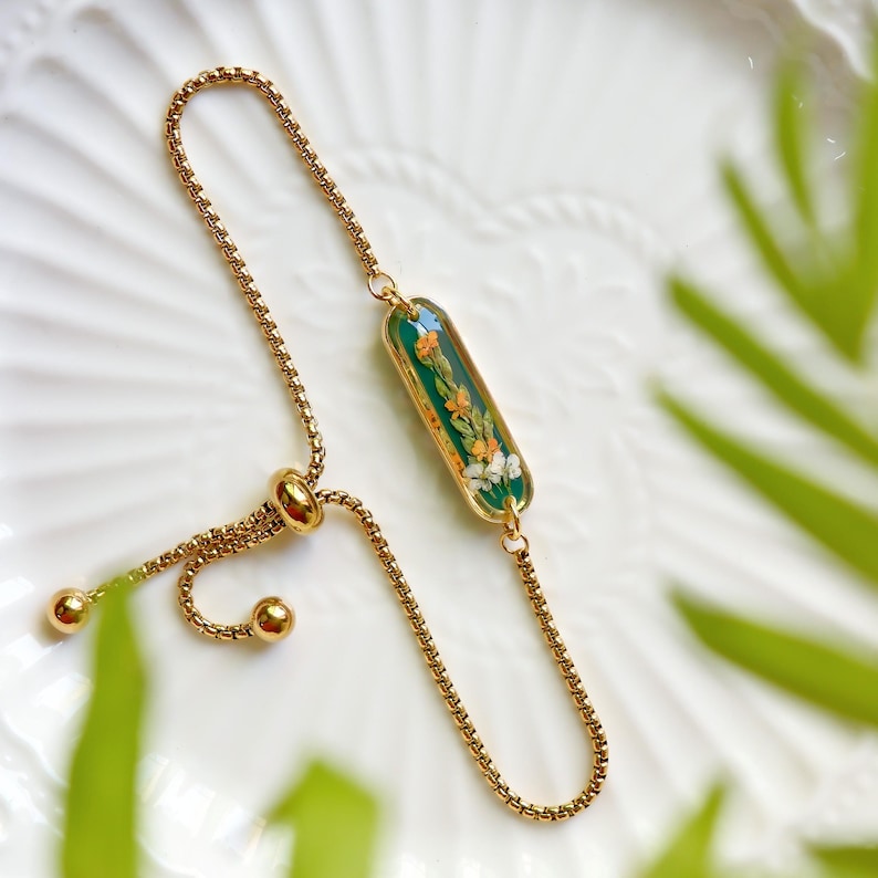 Aura Orange Botanical Resin Strand — 18K Gold Plated Emerald & Floral Chain Bracelet