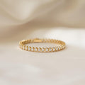 Aura Bezel Oval Tennis Strand — 14K Gold & Rhodium Plated Solitaire Bracelet