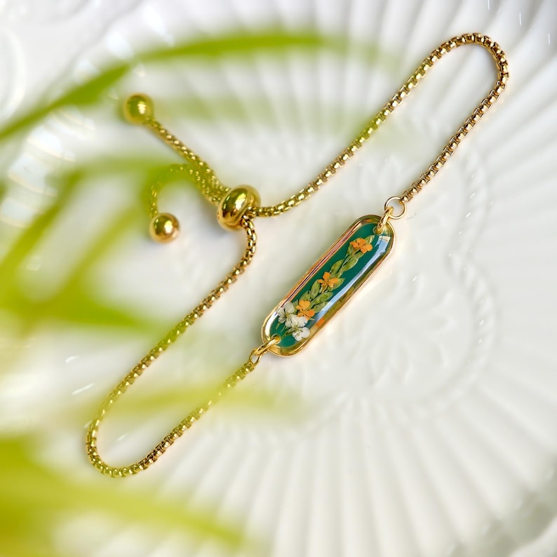 Aura Orange Botanical Resin Strand — 18K Gold Plated Emerald & Floral Chain Bracelet