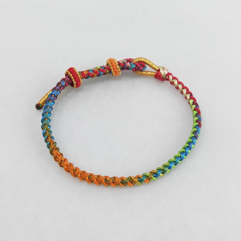 Aura Tibetan Lucky Knot Strand — Waterproof Braided Buddhist Rope Bracelet