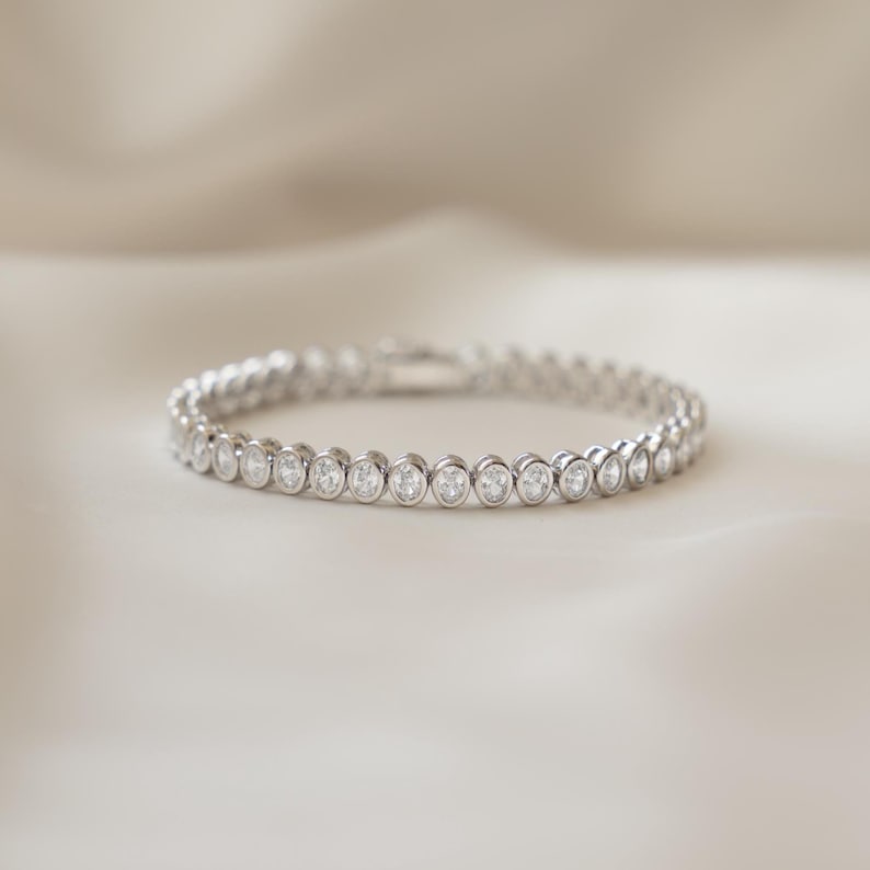 Aura Bezel Oval Tennis Strand — 14K Gold & Rhodium Plated Solitaire Bracelet