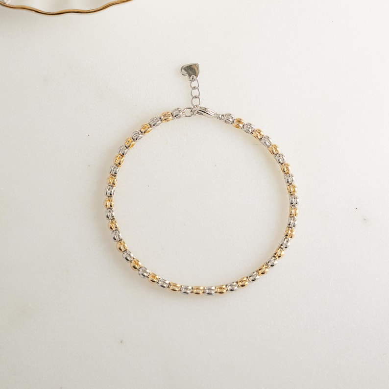 Duality Mixed Metal Tennis Strand — Two-Tone Solitaire Aura