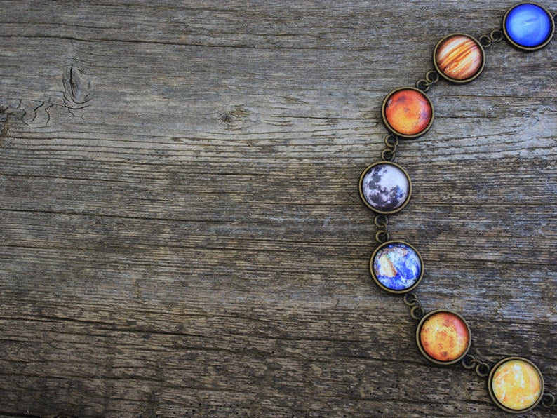 Aura Cosmic Cabochon Bracelet — Bronze Solar System Planet Strand