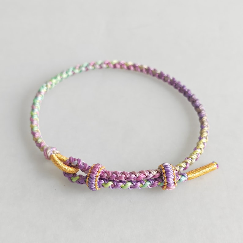 Aura Tibetan Lucky Knot Strand — Waterproof Braided Buddhist Rope Bracelet