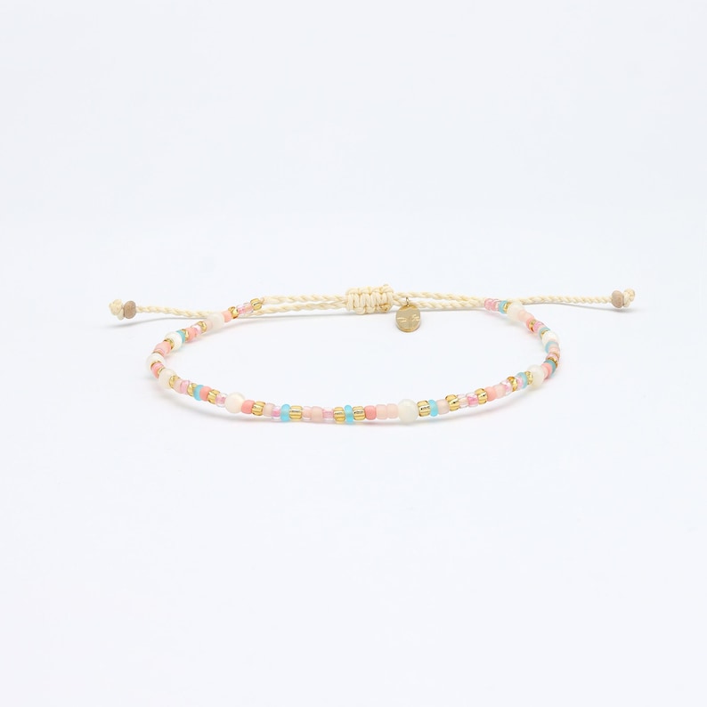 Surya Seed Bead Talisman — Solar Shell & Turquoise Strand