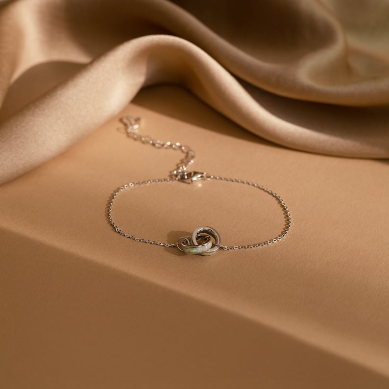 Infinite Opal Interlocking Bracelet — Sacred Eternity Charm