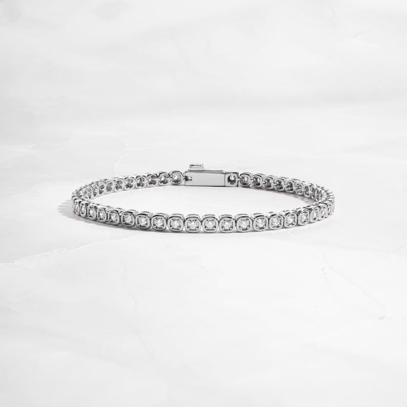 Classic Bezel Tennis Strand — Shimmering Solitaire Aura