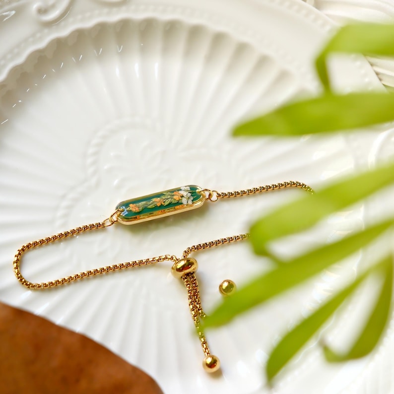 Aura Orange Botanical Resin Strand — 18K Gold Plated Emerald & Floral Chain Bracelet