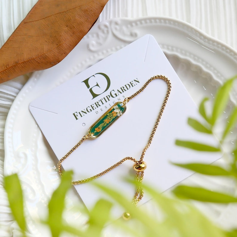 Aura Orange Botanical Resin Strand — 18K Gold Plated Emerald & Floral Chain Bracelet