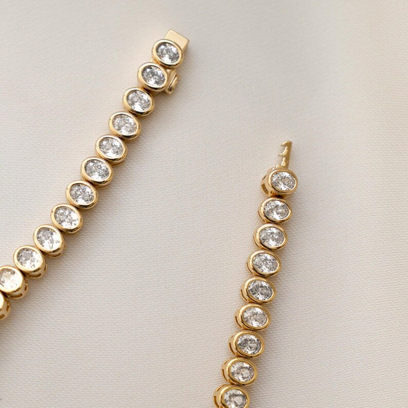 Aura Bezel Oval Tennis Strand — 14K Gold & Rhodium Plated Solitaire Bracelet