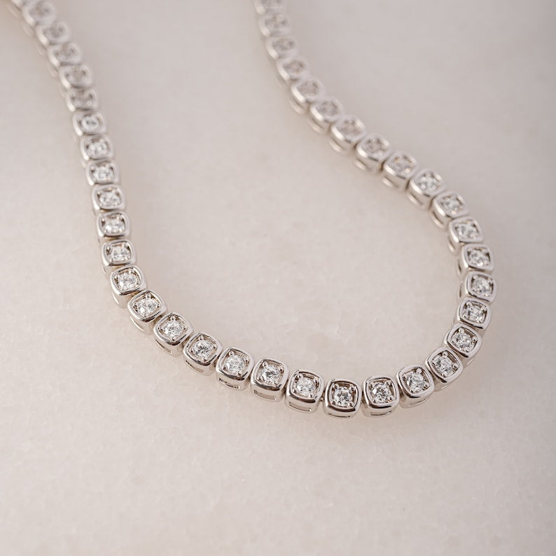 Classic Bezel Tennis Strand — Shimmering Solitaire Aura