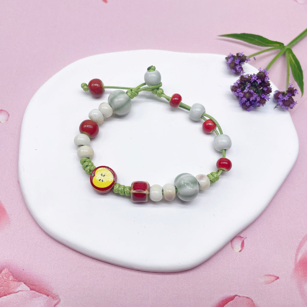 Aura Artisan Ceramic Charm Strand — Hand-Woven Friendship Bracelet