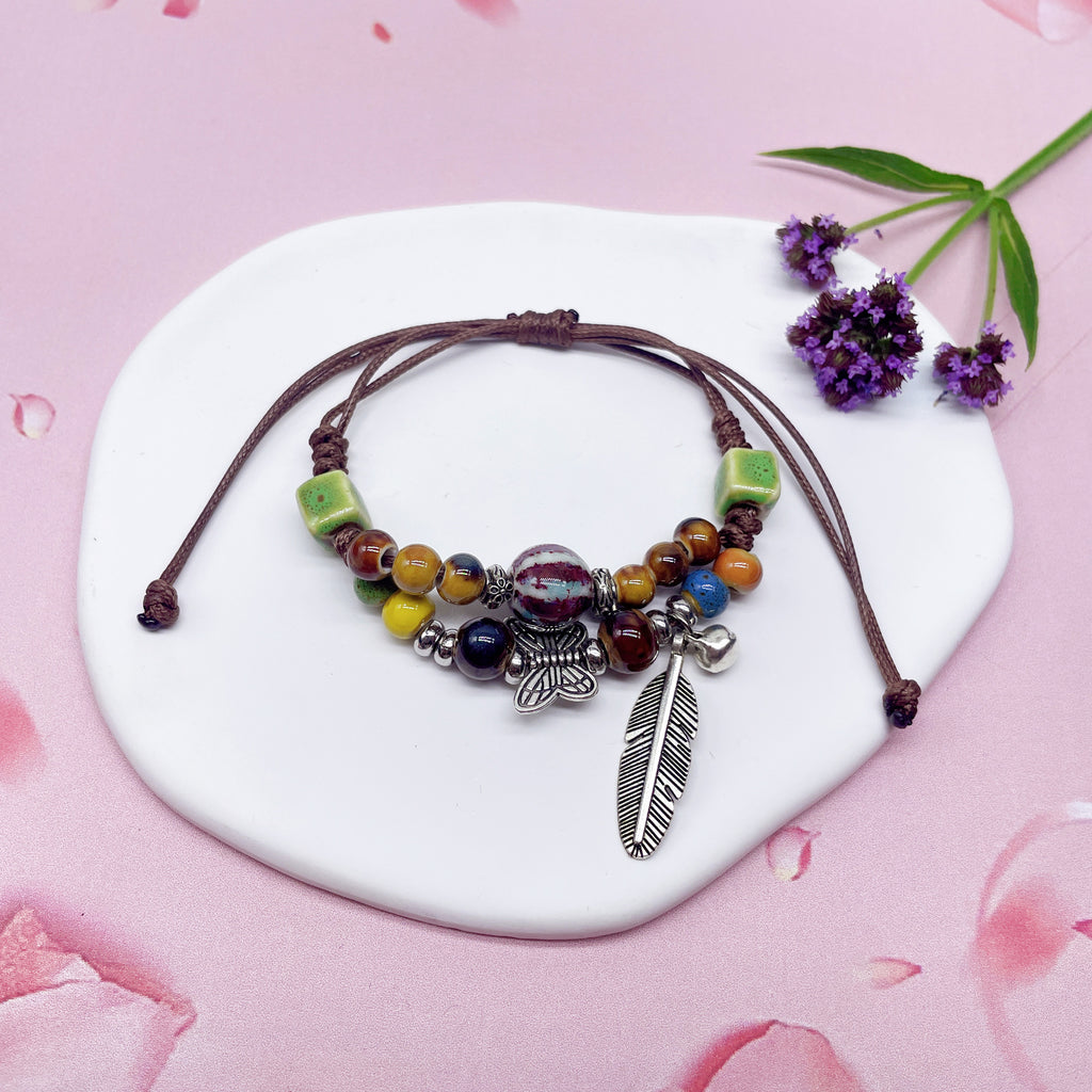 Aura Artisan Ceramic Charm Strand — Hand-Woven Friendship Bracelet