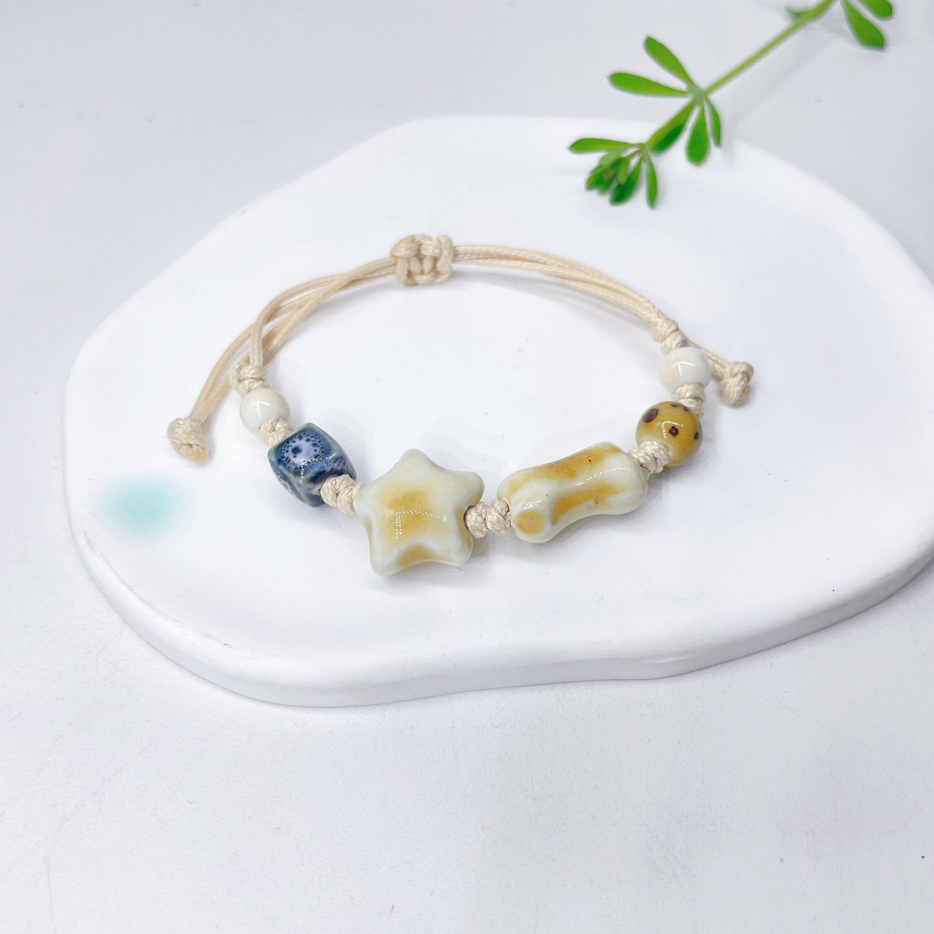 Aura Artisan Ceramic Charm Strand — Hand-Woven Friendship Bracelet