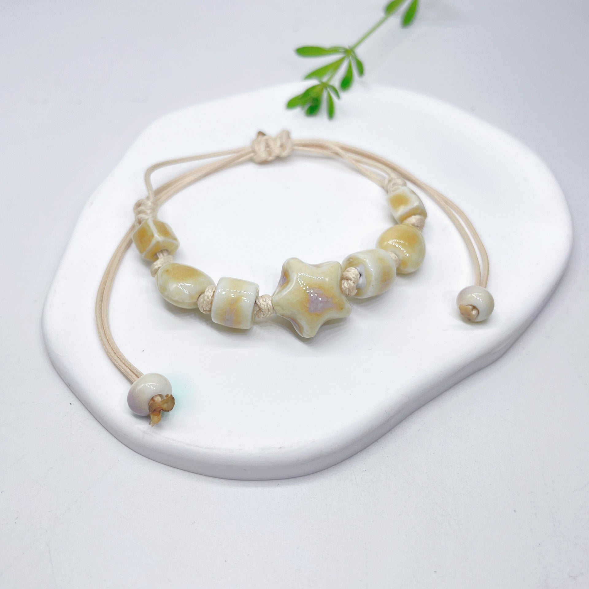 Aura Artisan Ceramic Charm Strand — Hand-Woven Friendship Bracelet