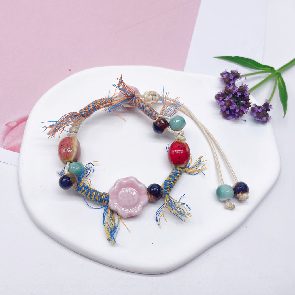 Aura Artisan Ceramic Charm Strand — Hand-Woven Friendship Bracelet