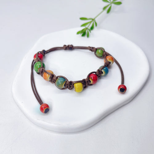 Aura Artisan Ceramic Charm Strand — Hand-Woven Friendship Bracelet
