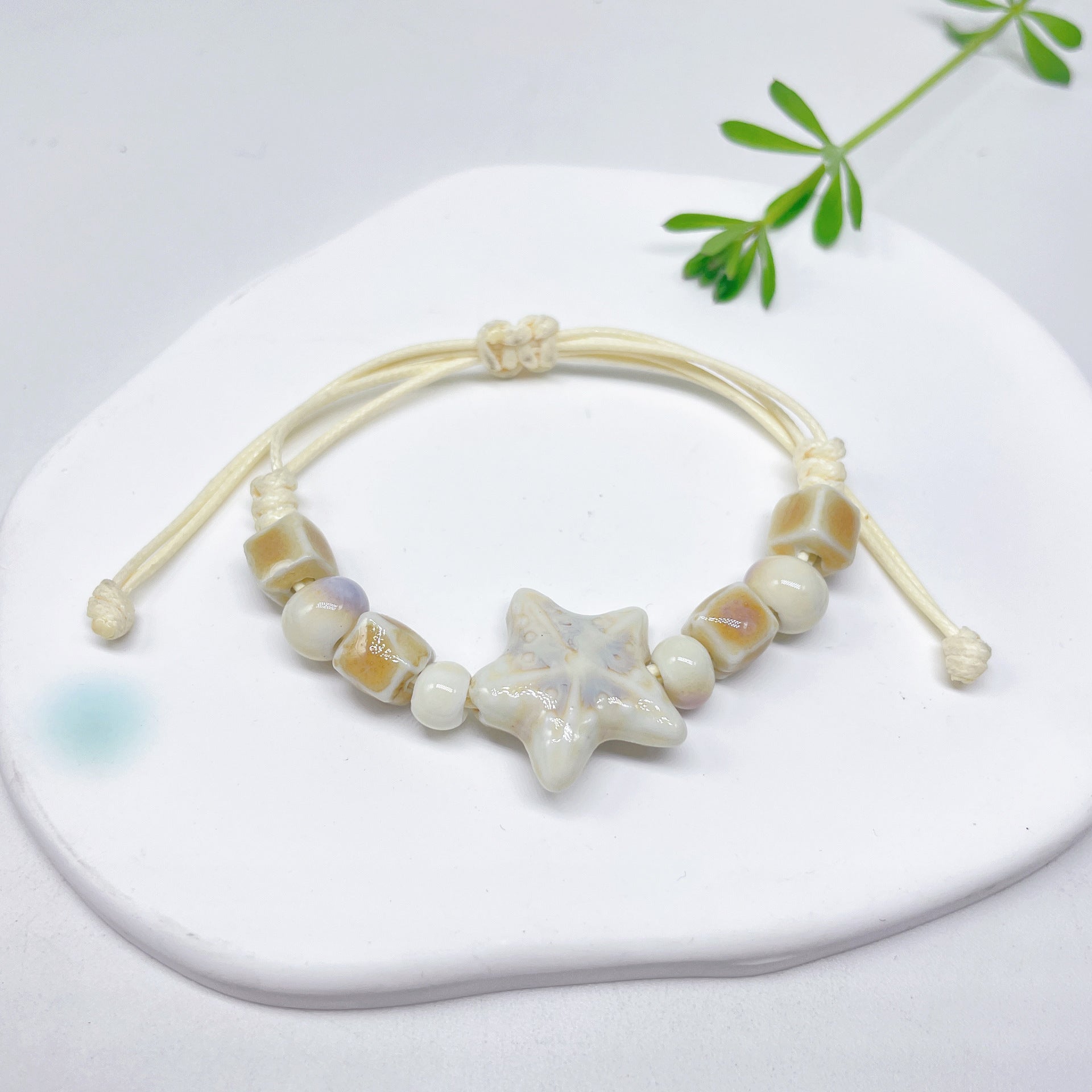 Aura Artisan Ceramic Charm Strand — Hand-Woven Friendship Bracelet