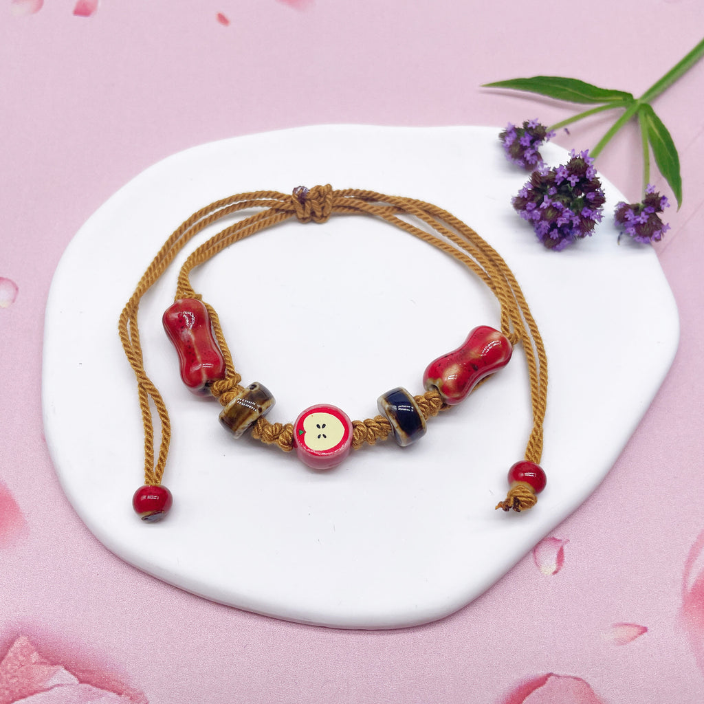 Aura Artisan Ceramic Charm Strand — Hand-Woven Friendship Bracelet