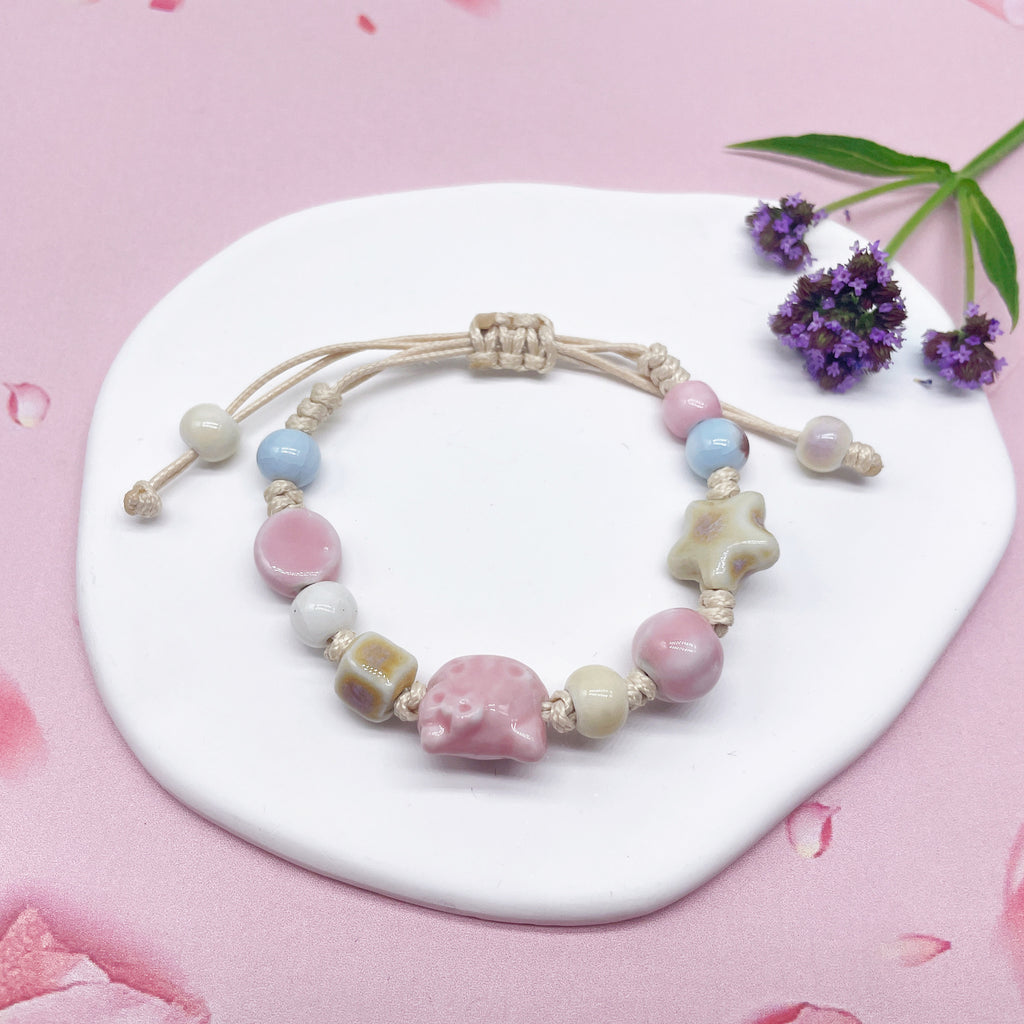 Aura Artisan Ceramic Charm Strand — Hand-Woven Friendship Bracelet