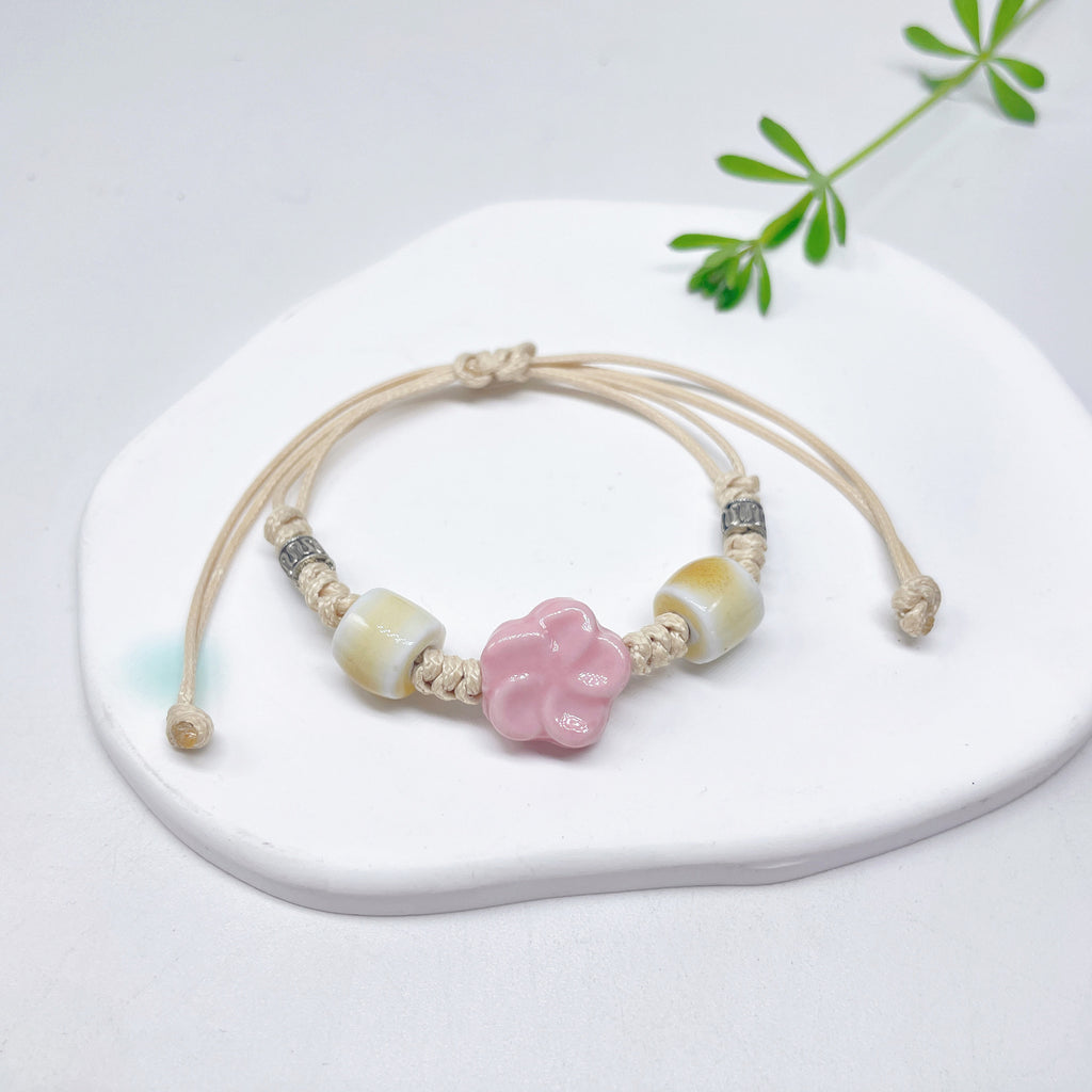Aura Artisan Ceramic Charm Strand — Hand-Woven Friendship Bracelet