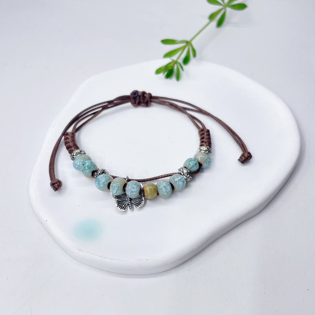 Aura Artisan Ceramic Charm Strand — Hand-Woven Friendship Bracelet