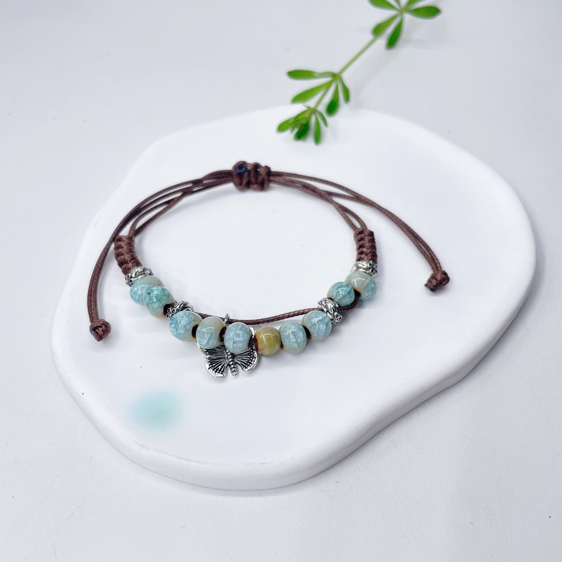 Aura Artisan Ceramic Charm Strand — Hand-Woven Friendship Bracelet