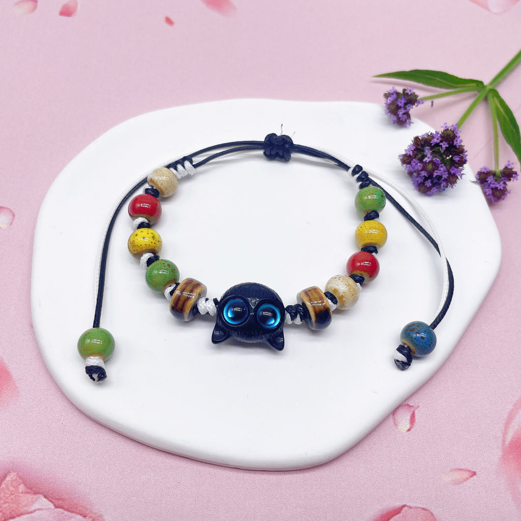 Aura Artisan Ceramic Charm Strand — Hand-Woven Friendship Bracelet