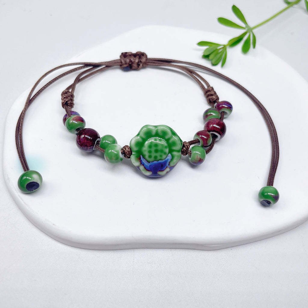 Aura Artisan Ceramic Charm Strand — Hand-Woven Friendship Bracelet