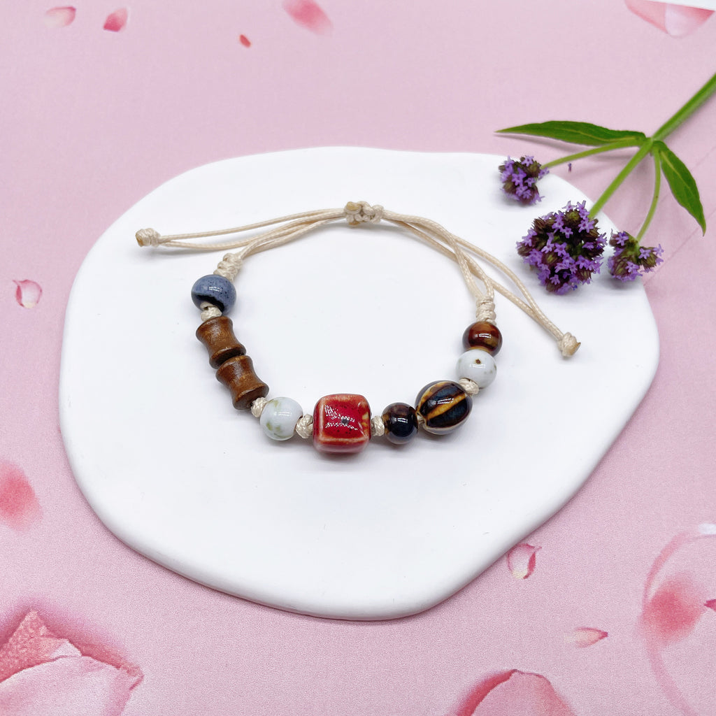 Aura Artisan Ceramic Charm Strand — Hand-Woven Friendship Bracelet