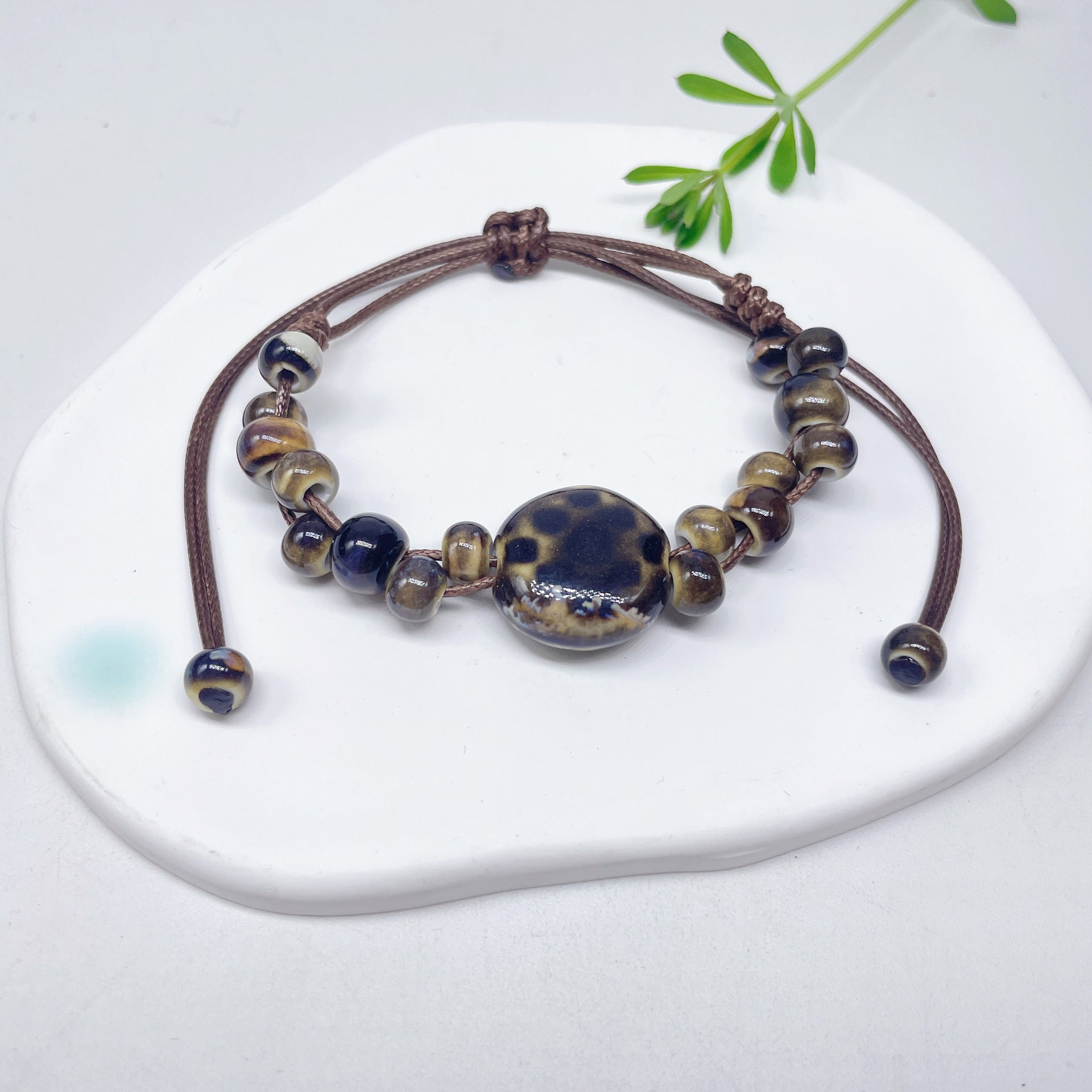 Aura Artisan Ceramic Charm Strand — Hand-Woven Friendship Bracelet