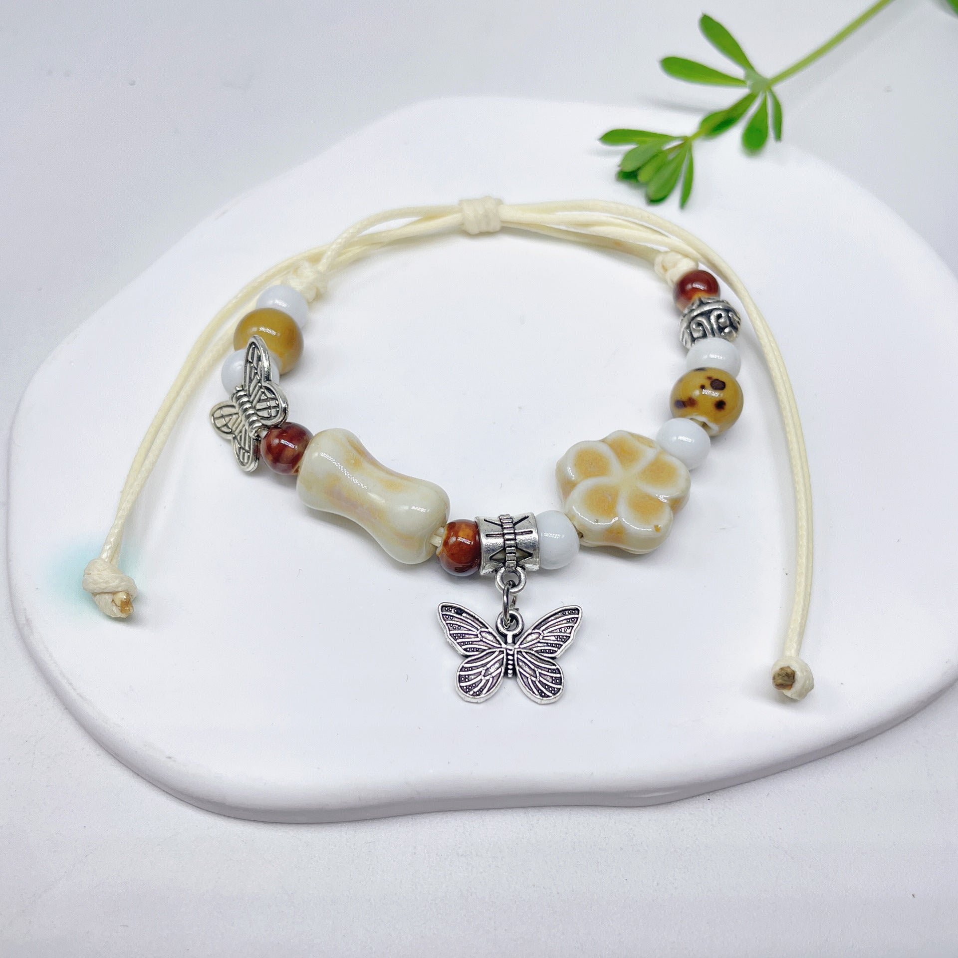 Aura Artisan Ceramic Charm Strand — Hand-Woven Friendship Bracelet