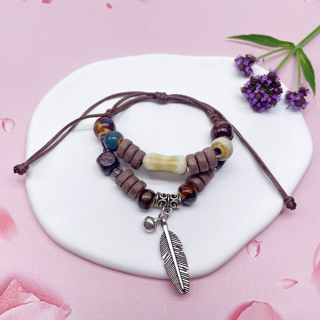 Aura Artisan Ceramic Charm Strand — Hand-Woven Friendship Bracelet