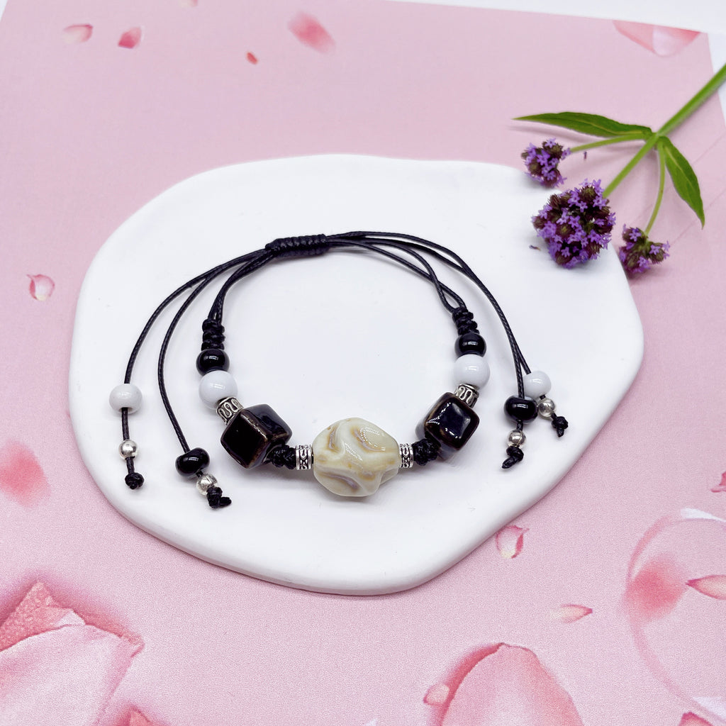 Aura Artisan Ceramic Charm Strand — Hand-Woven Friendship Bracelet
