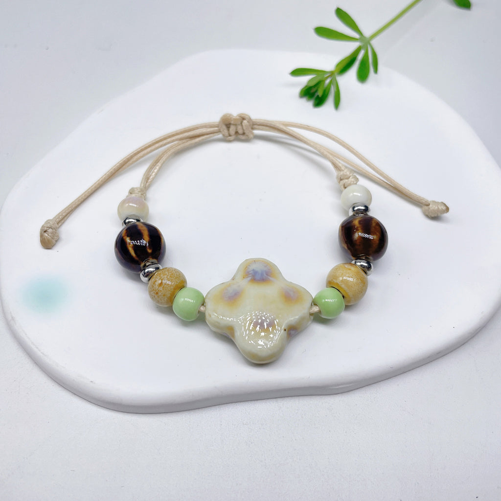 Aura Artisan Ceramic Charm Strand — Hand-Woven Friendship Bracelet