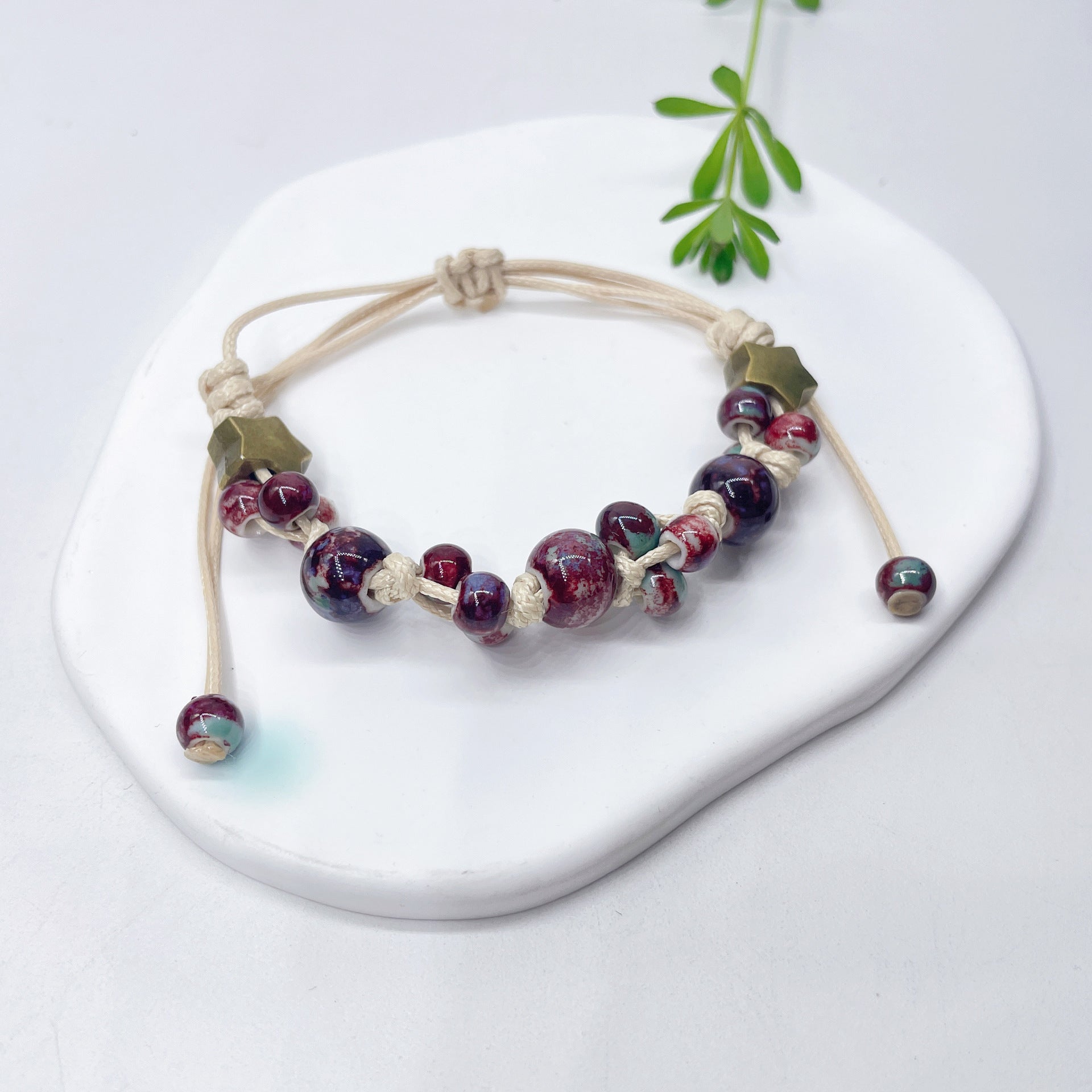 Aura Artisan Ceramic Charm Strand — Hand-Woven Friendship Bracelet