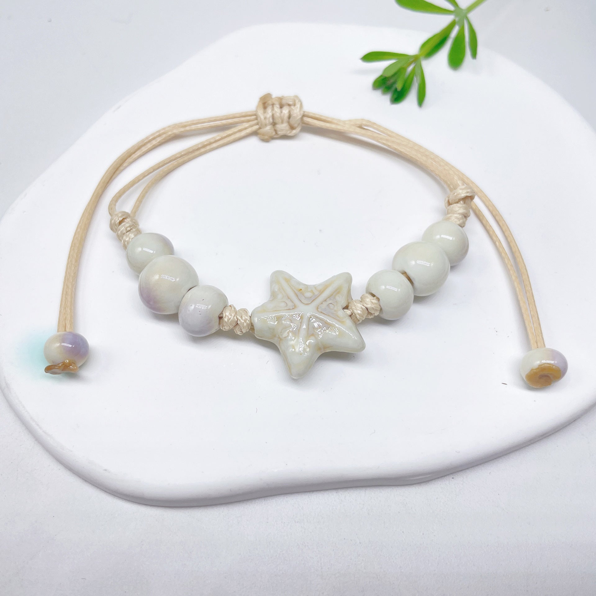 Aura Artisan Ceramic Charm Strand — Hand-Woven Friendship Bracelet
