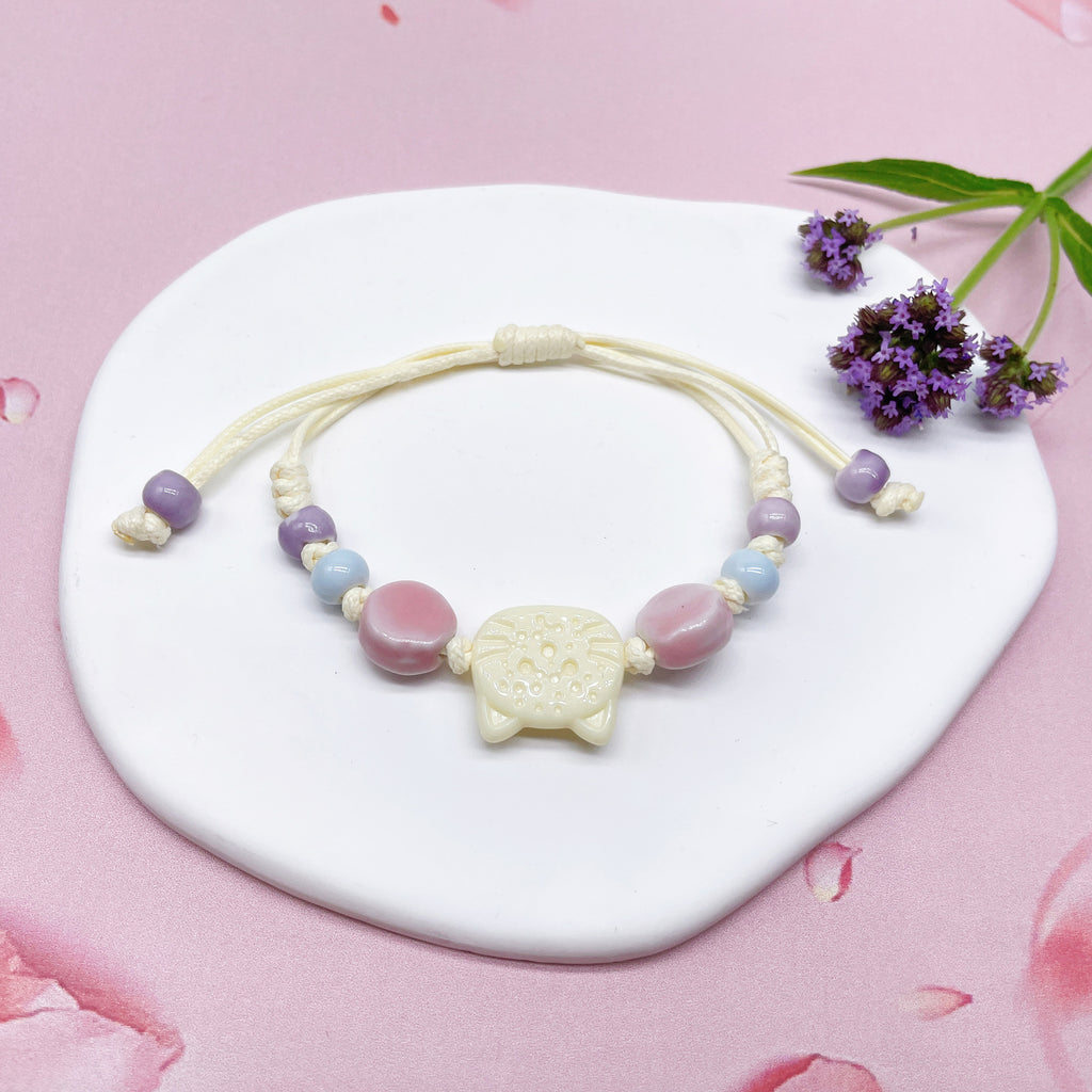 Aura Artisan Ceramic Charm Strand — Hand-Woven Friendship Bracelet
