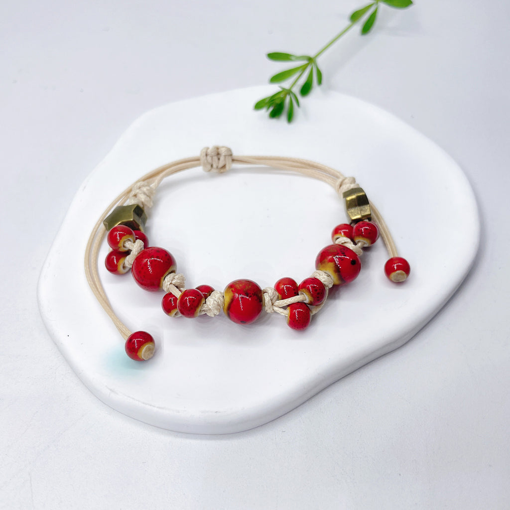 Aura Artisan Ceramic Charm Strand — Hand-Woven Friendship Bracelet