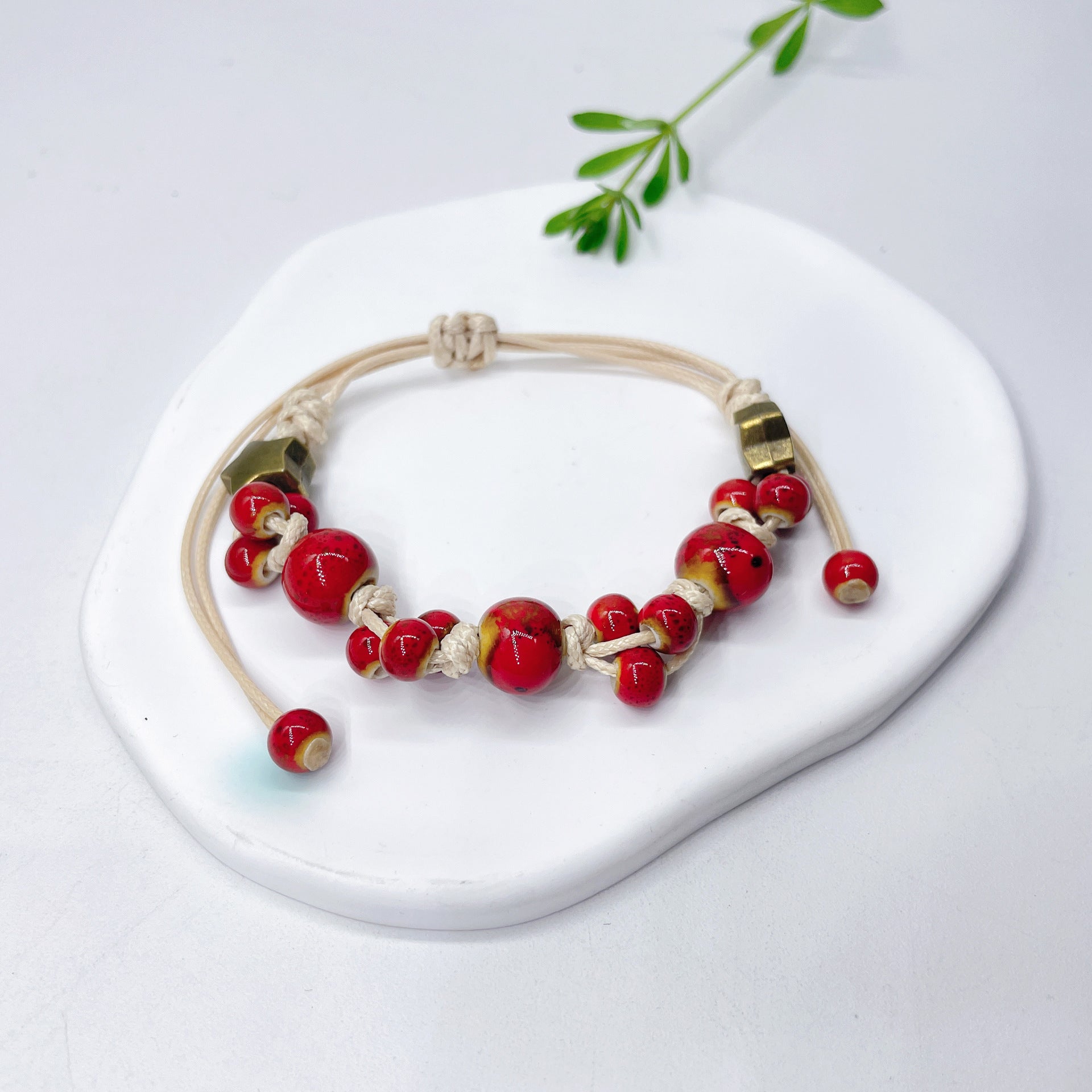 Aura Artisan Ceramic Charm Strand — Hand-Woven Friendship Bracelet