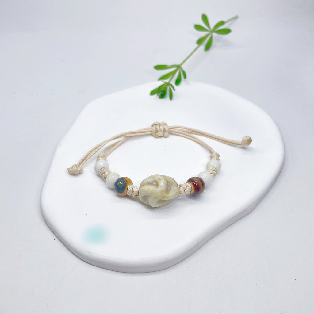 Aura Artisan Ceramic Charm Strand — Hand-Woven Friendship Bracelet