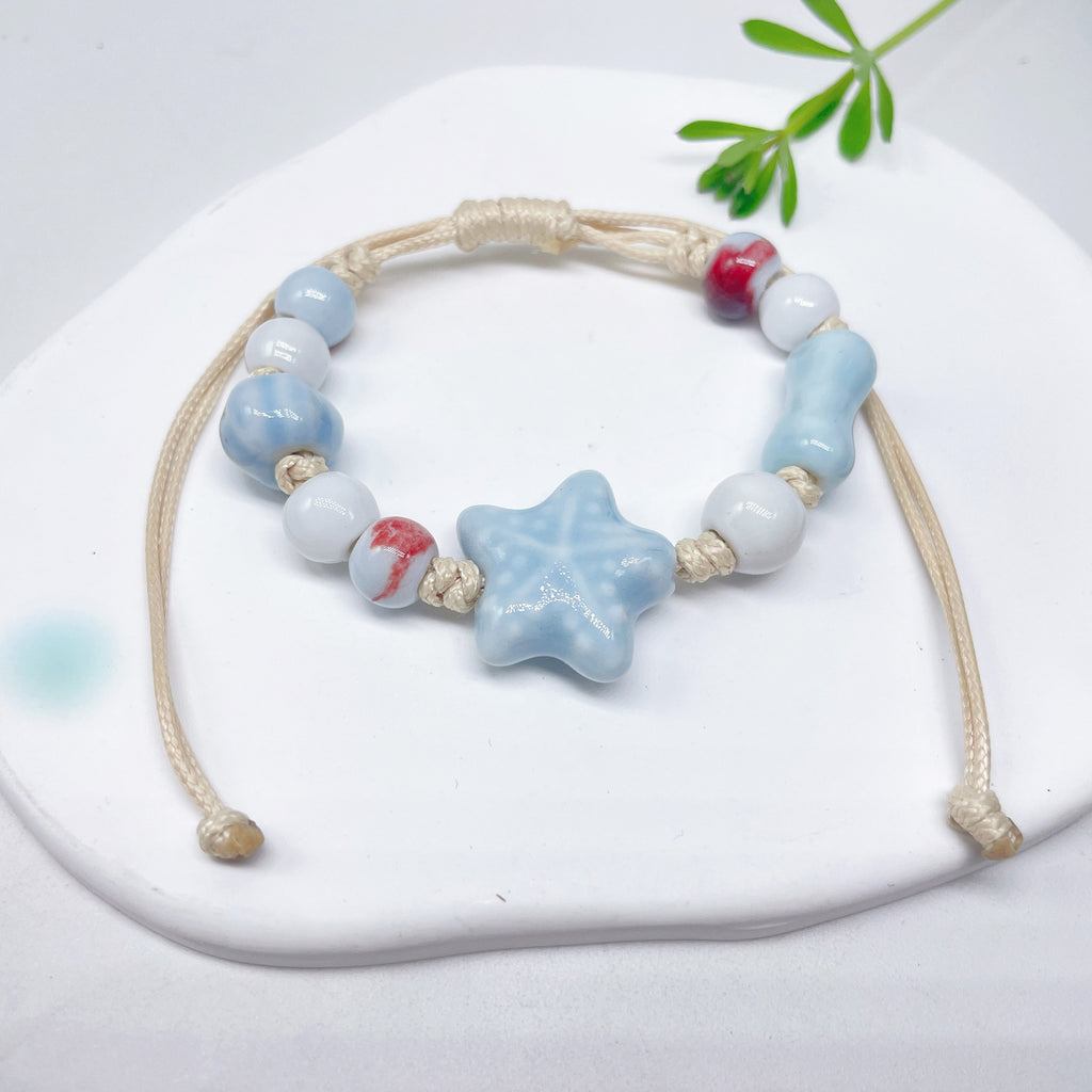 Aura Artisan Ceramic Charm Strand — Hand-Woven Friendship Bracelet