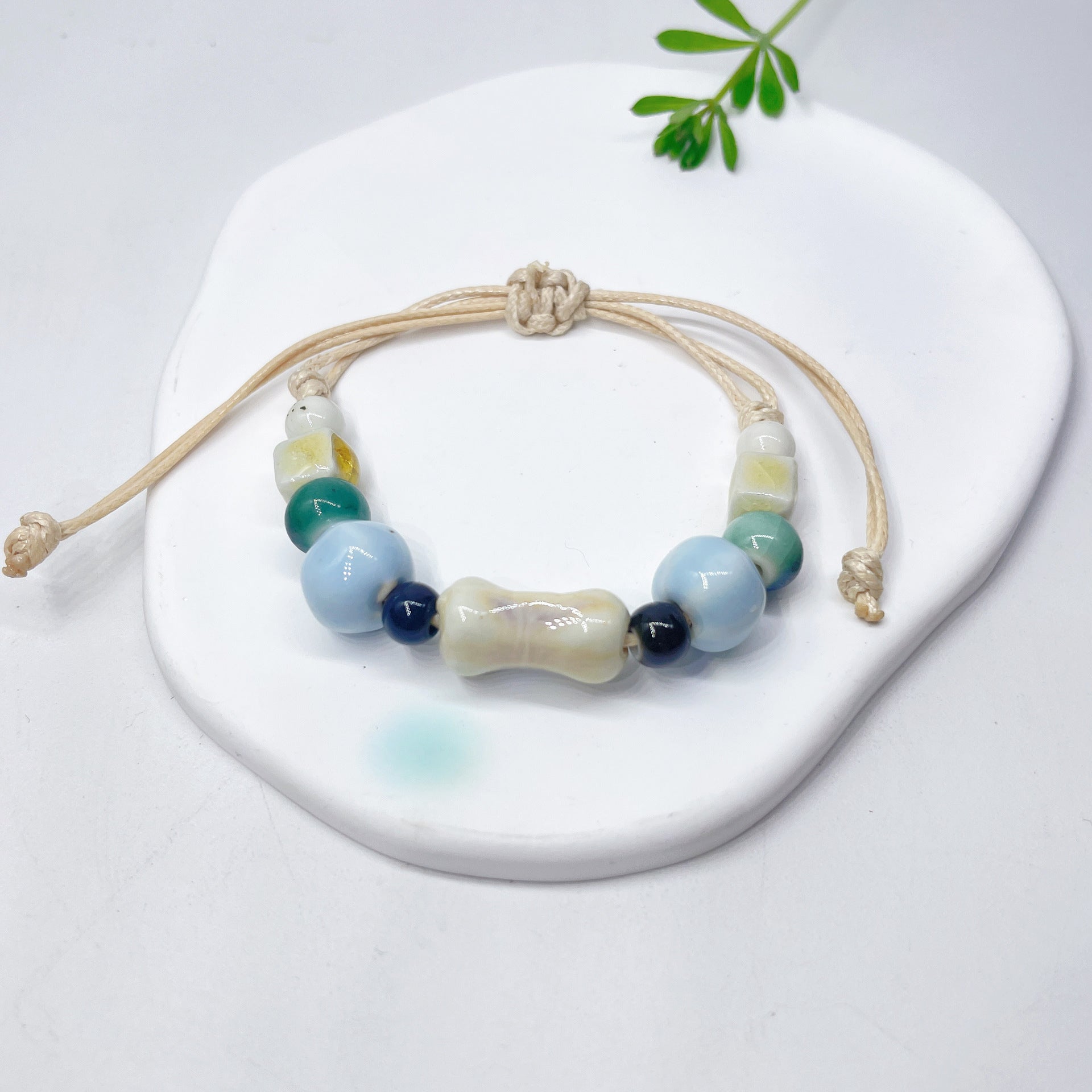 Aura Artisan Ceramic Charm Strand — Hand-Woven Friendship Bracelet