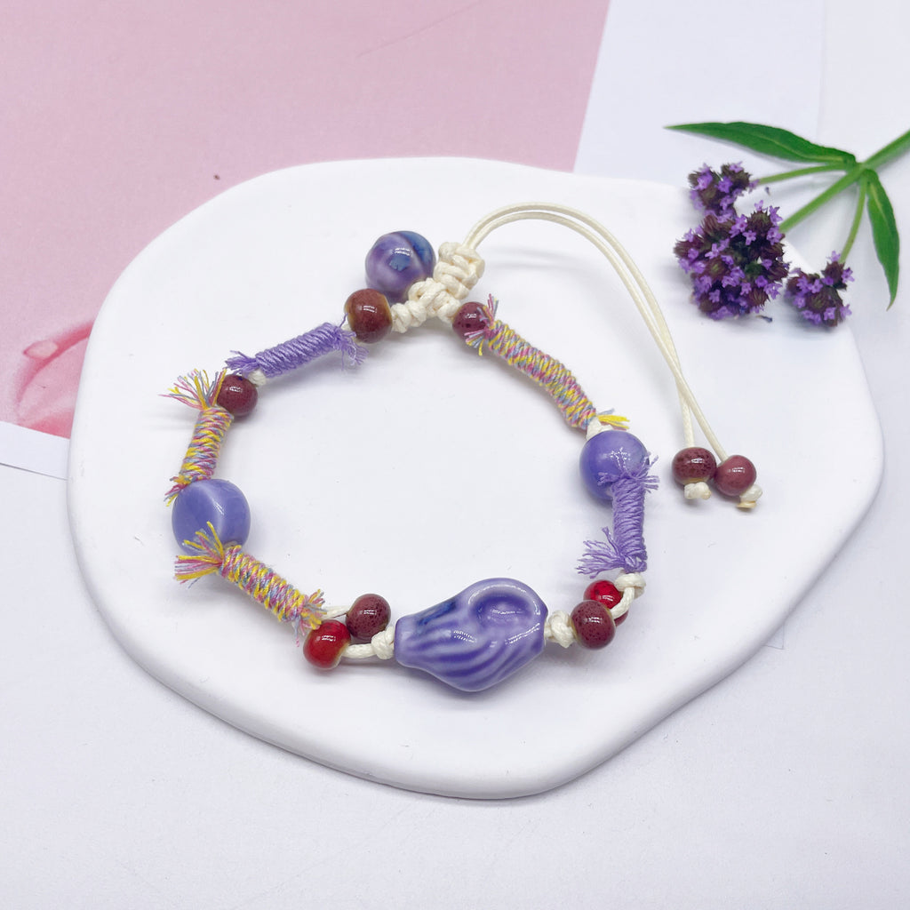 Aura Artisan Ceramic Charm Strand — Hand-Woven Friendship Bracelet