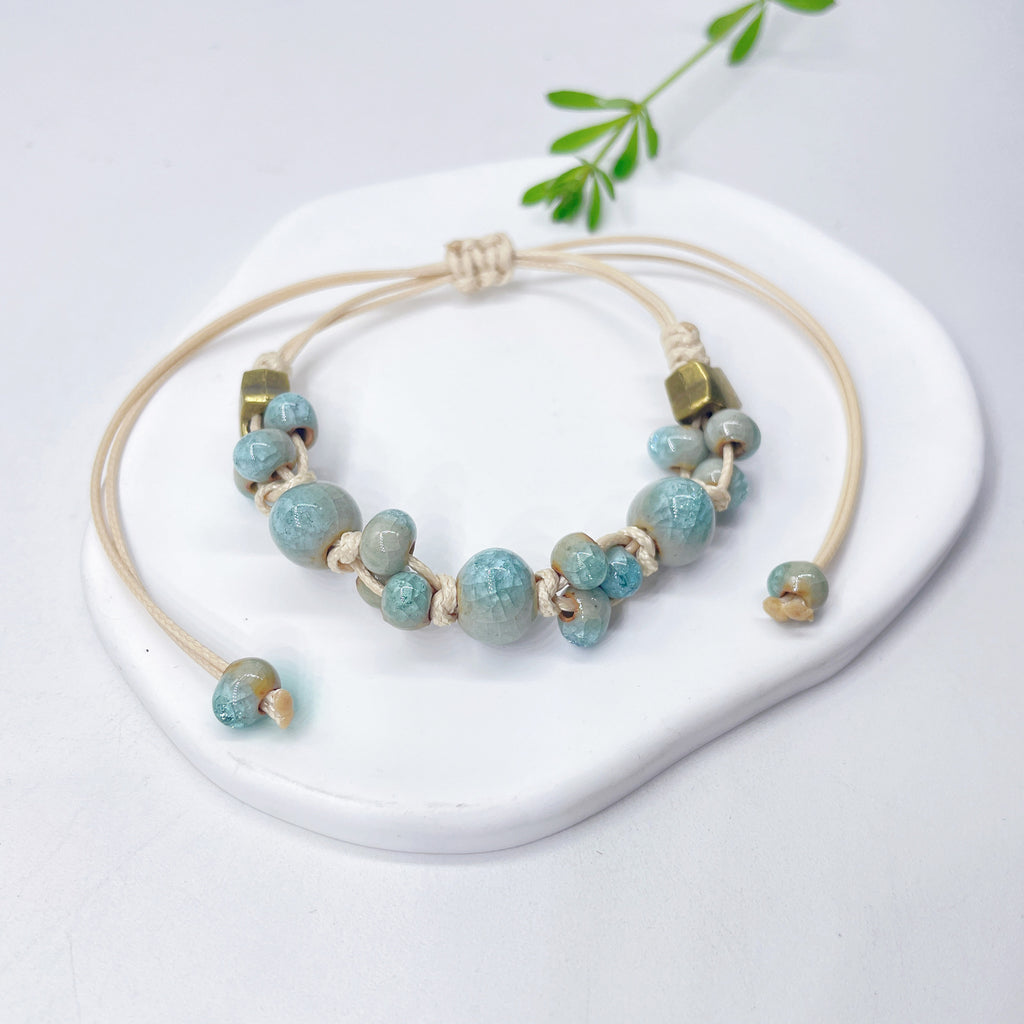 Aura Artisan Ceramic Charm Strand — Hand-Woven Friendship Bracelet