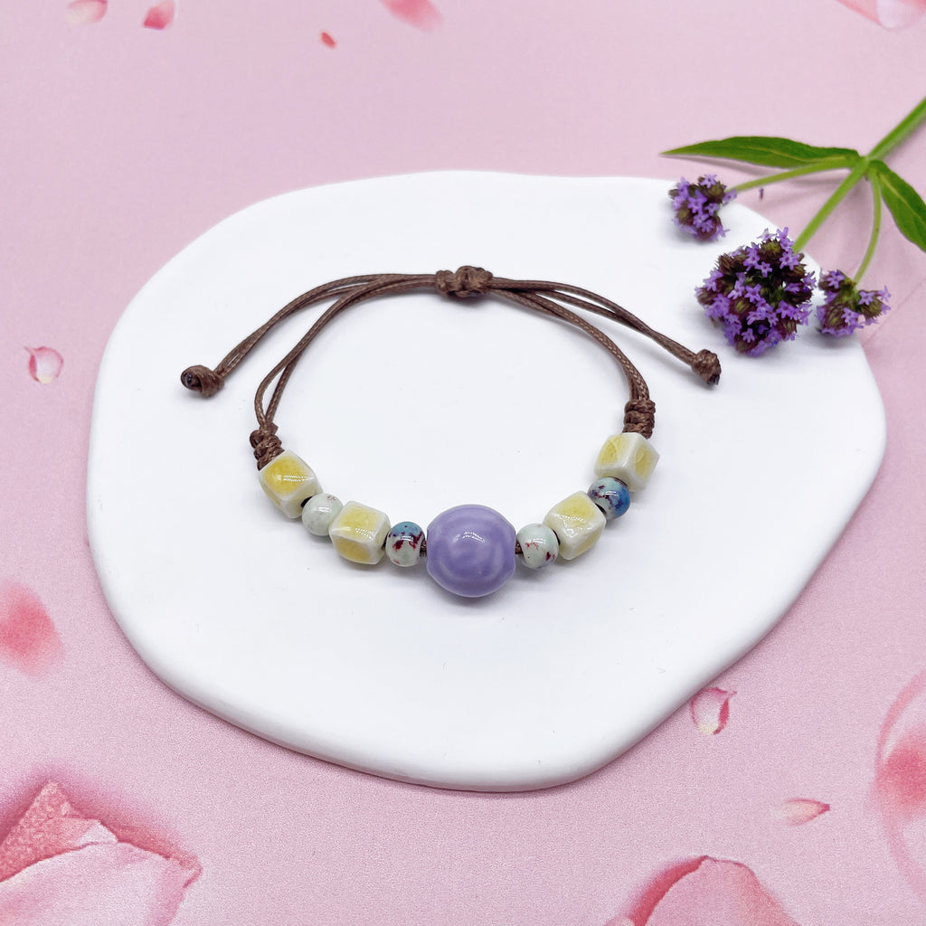 Aura Artisan Ceramic Charm Strand — Hand-Woven Friendship Bracelet
