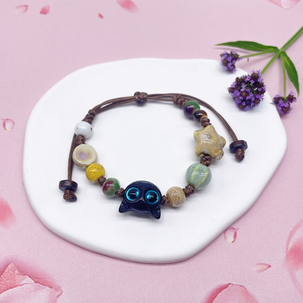 Aura Artisan Ceramic Charm Strand — Hand-Woven Friendship Bracelet