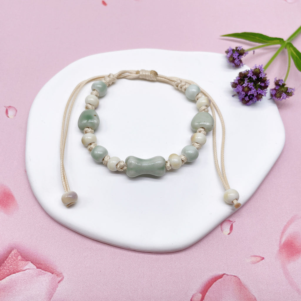 Aura Artisan Ceramic Charm Strand — Hand-Woven Friendship Bracelet