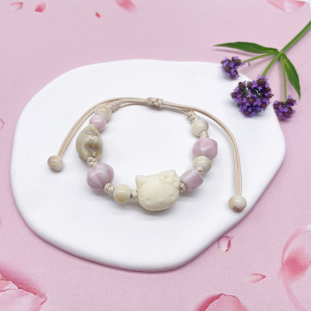 Aura Artisan Ceramic Charm Strand — Hand-Woven Friendship Bracelet