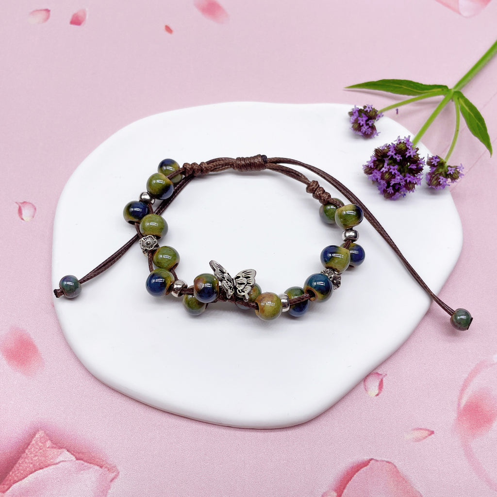Aura Artisan Ceramic Charm Strand — Hand-Woven Friendship Bracelet